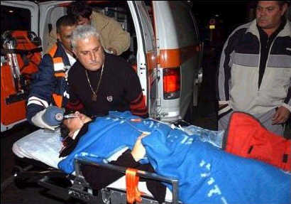 Ella Abukasis being treated after a Palestinian rocket critically wounded her.